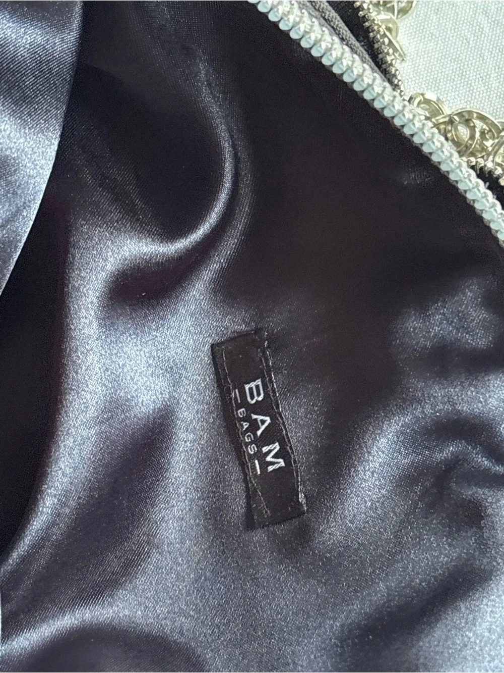 black and silver bag by BAM Bag